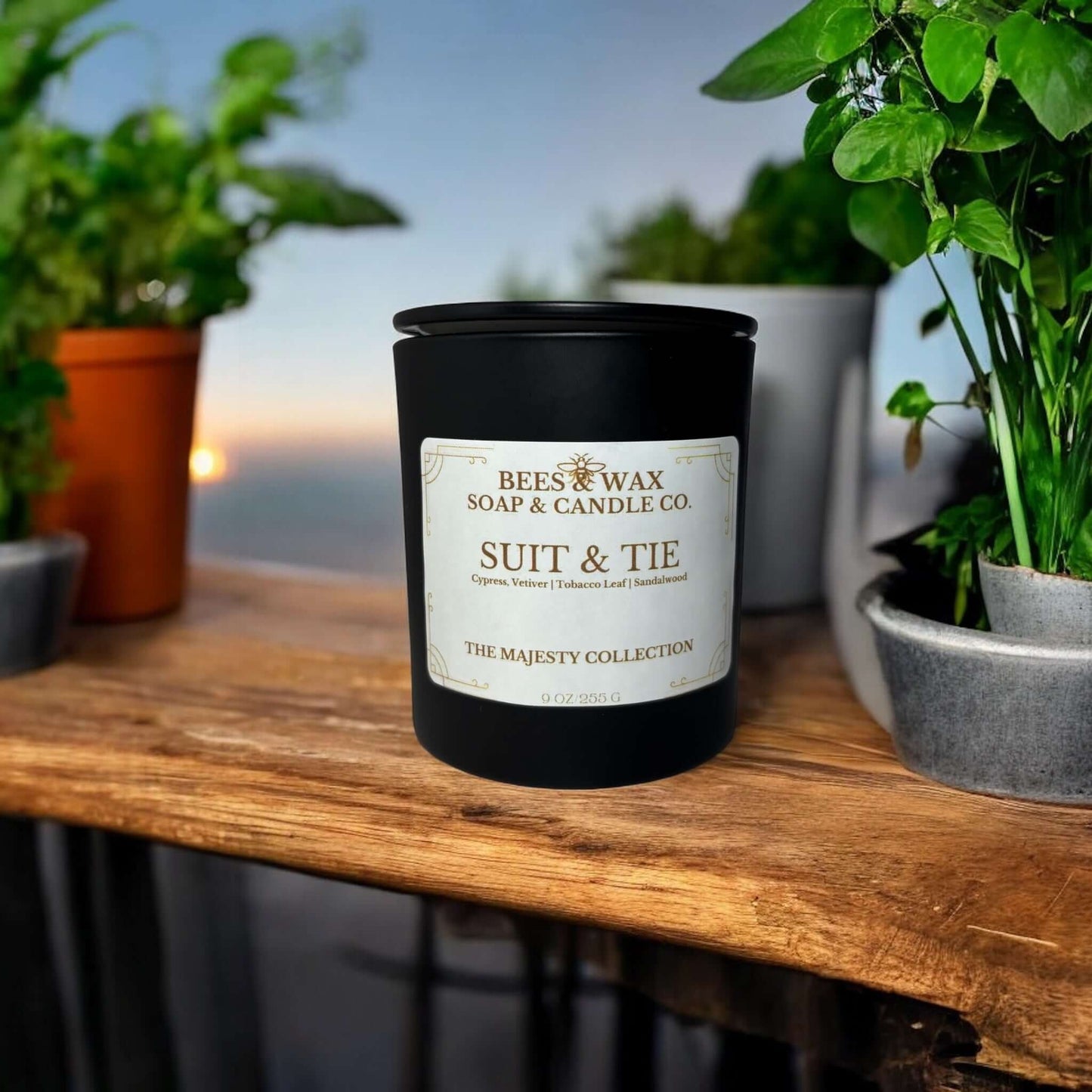Majesty Collection candle from Bees & Wax, Suit & Tie scent with notes of vanilla, tobacco, and mahogany.