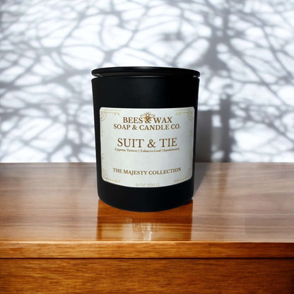 Bees & Wax Majesty Collection candle in black jar, featuring Suit & Tie fragrance with creamy vanilla and smokey tobacco.